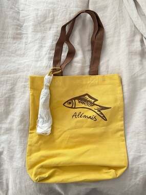 ALÉMAIS Mona Library Tote Bag in Yellow with Fish Logo
